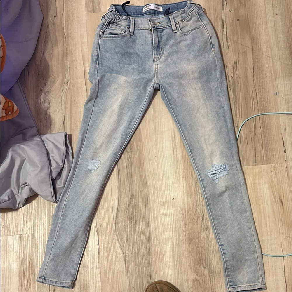 Blue Skinny Jeans with Distressed Details